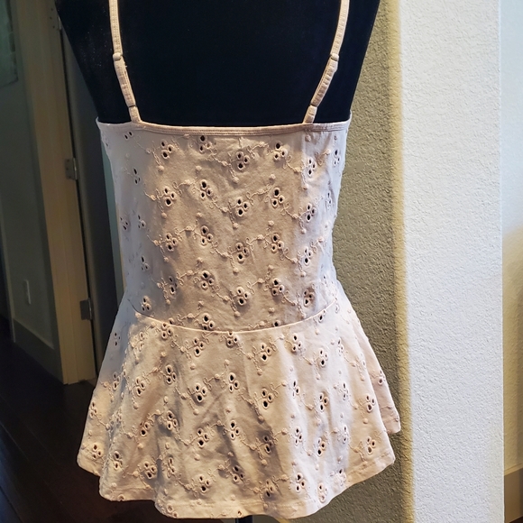 Hinge open eyelet peplum top - Picture 6 of 11